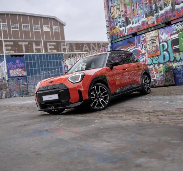 MINI_Aceman_Oranje_Rood_Voorkant_Zijkant_Graffiti_Ekris_Header_Mobile